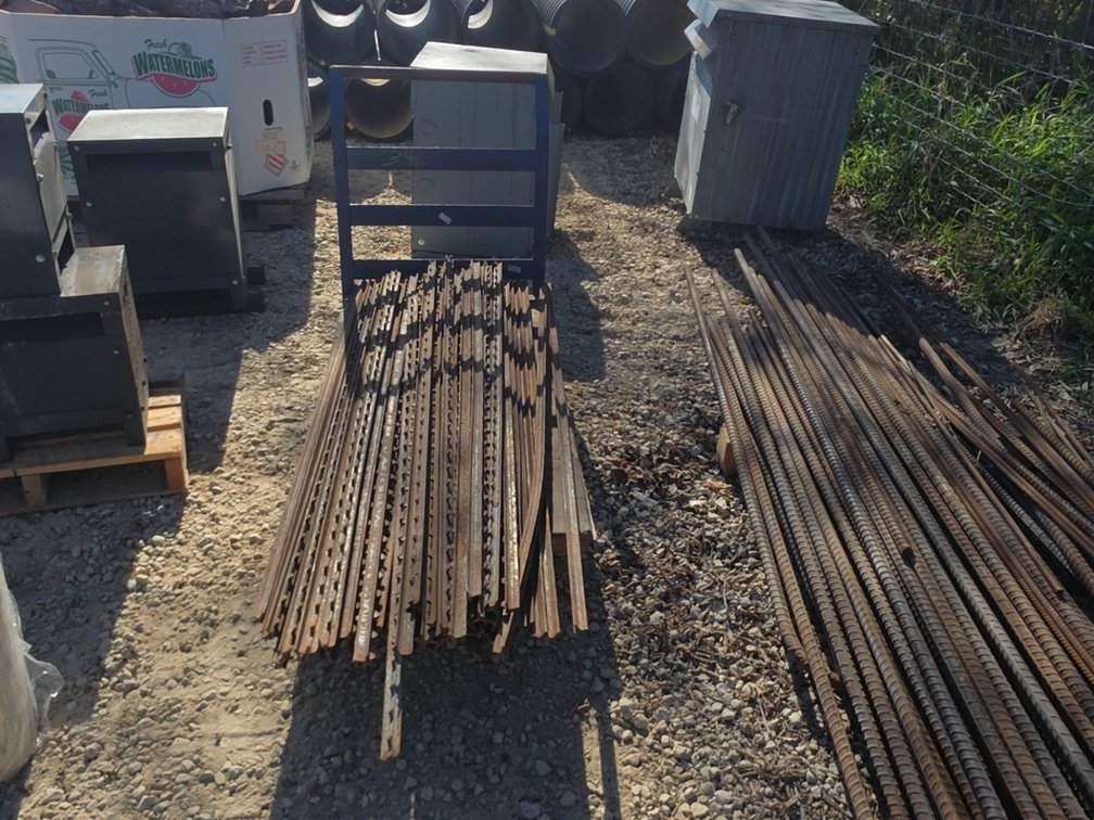 (APPROX. 50) 5’ FENCE POSTS ON SHOP CART