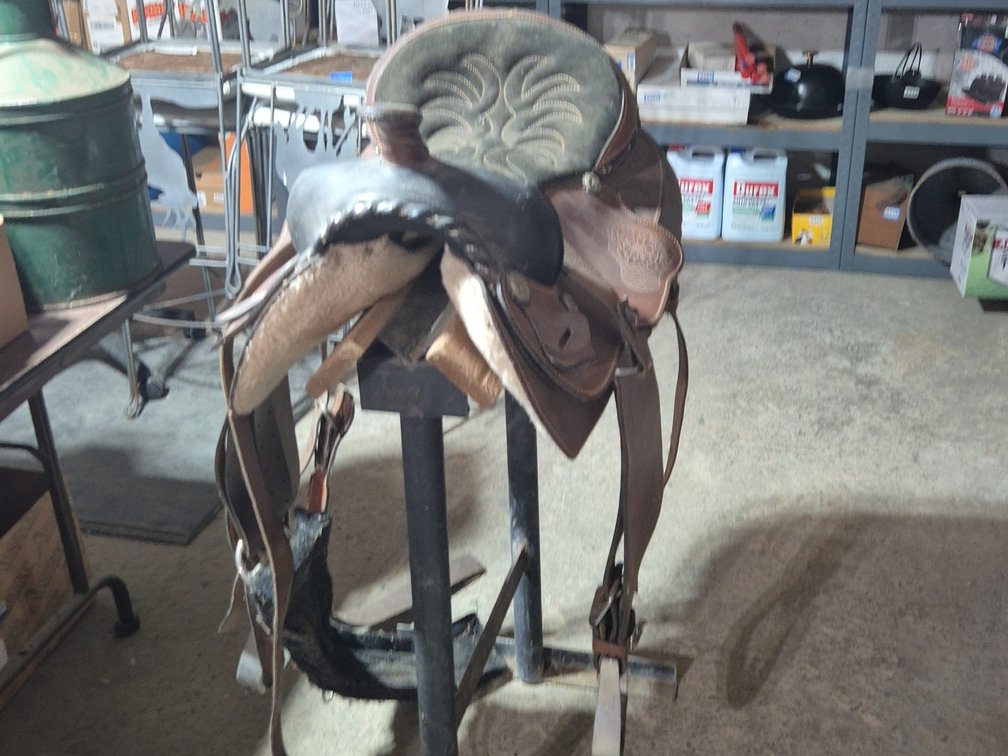 HORSE SADDLE ON STAND