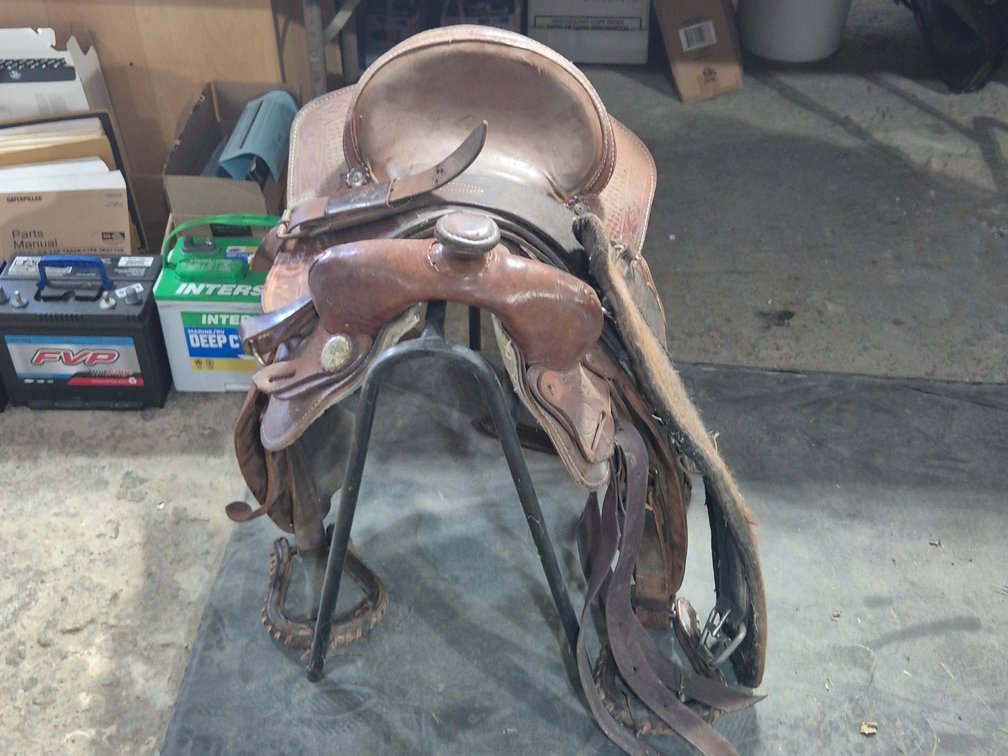 HORSE SADDLE ON STAND