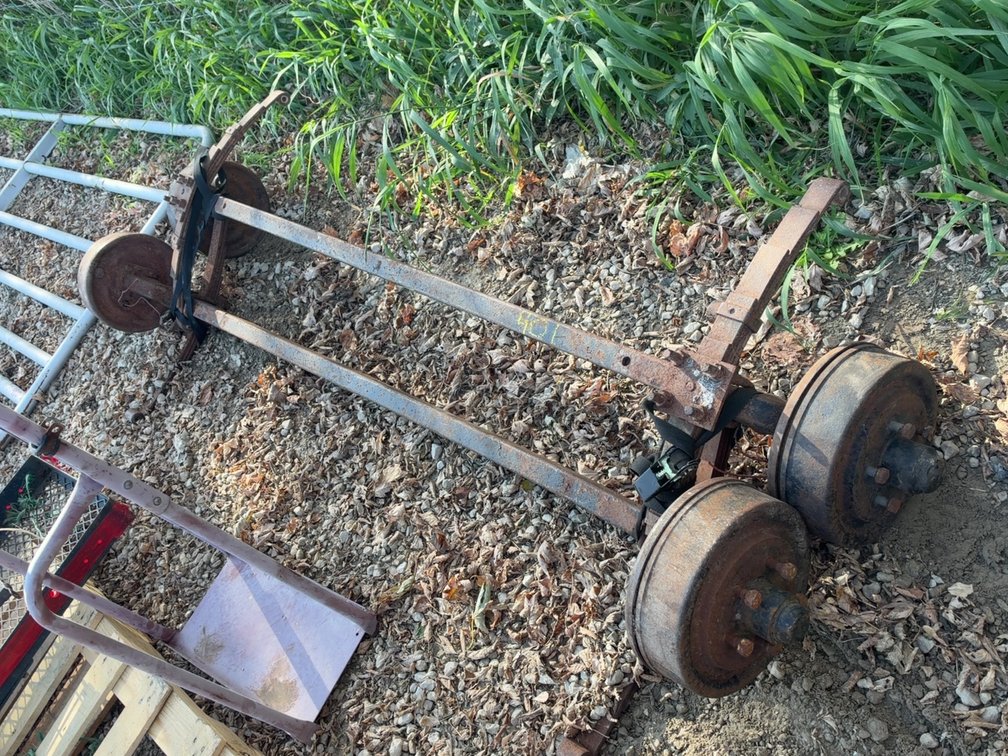 PAIR OF 5 BOLT AXELS W/ ELECTRIC BRAKES
