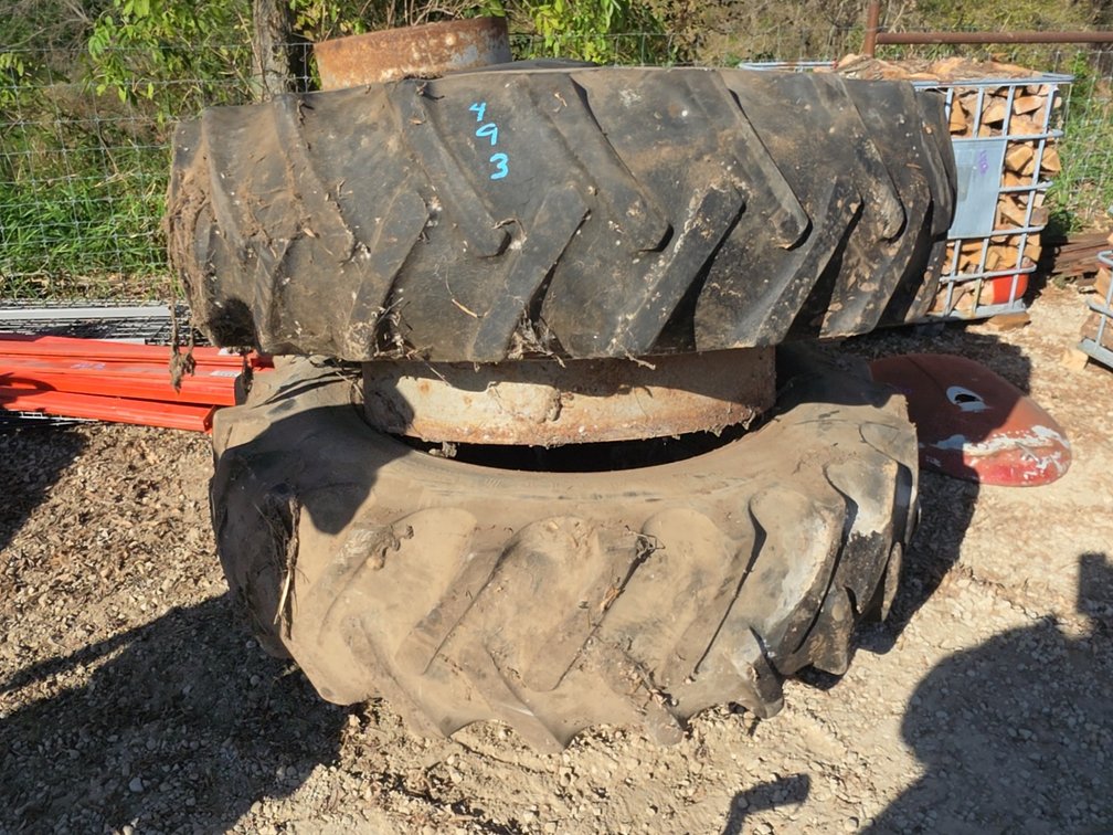 PAIR OF 18.4-38 TIRES ON CLAMP ON DUAL RIMS W/ HARDWARE