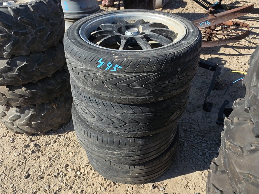 (4) 215/45R17 TIRES ON 5 BOLT RIMS