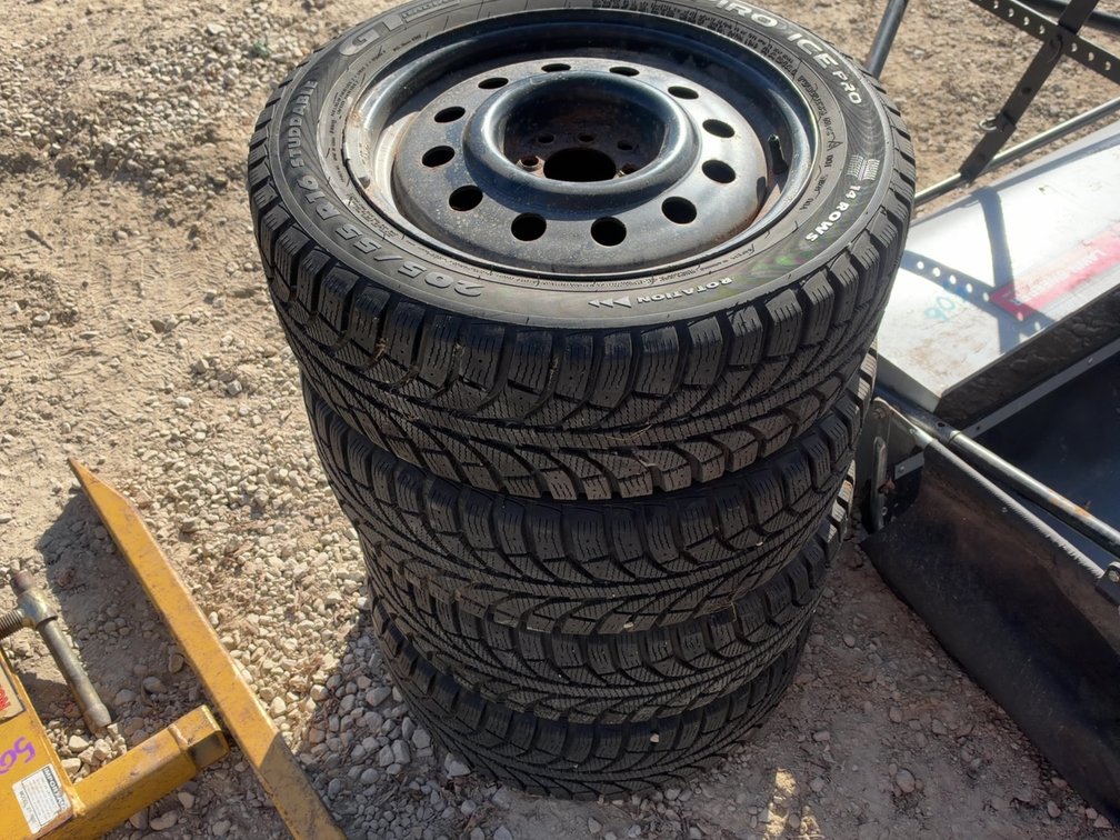 (4) 205/55R16 TIRES ON 8 BOLT RIMS