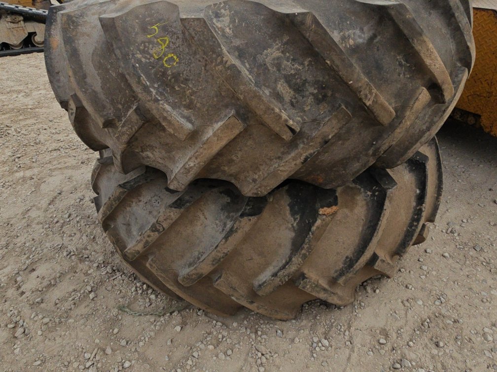 PAIR 18.4-26 TIRES ON 8 BOLT RIMS