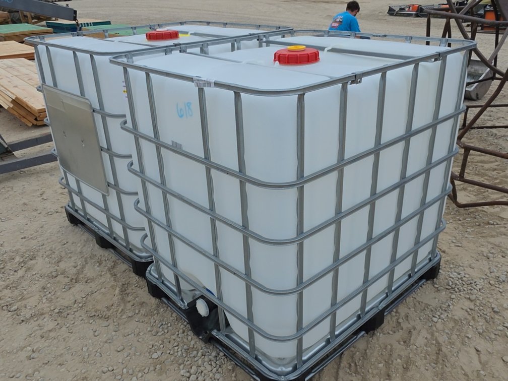 PAIR 250 GALLON POLY TOTE IN CAGE