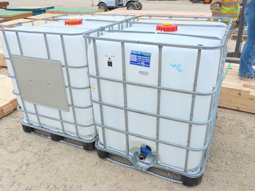 PAIR 250 GALLON POLY TOTE IN CAGE