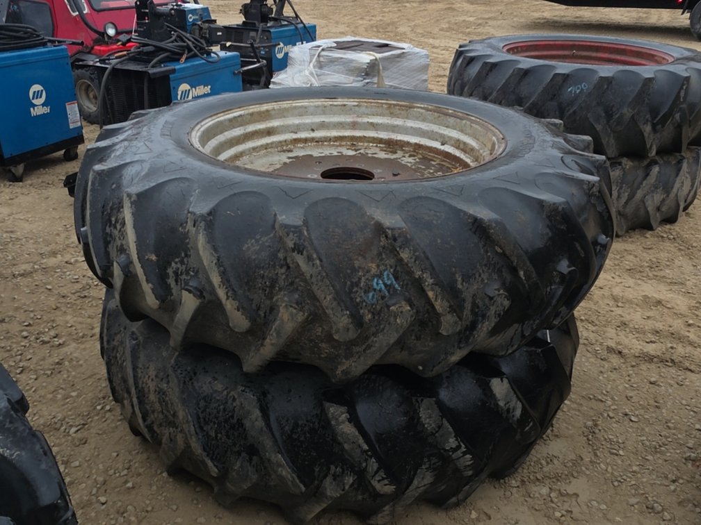 PAIR 18.4-38 TIRES ON 9 BOLT RIMS