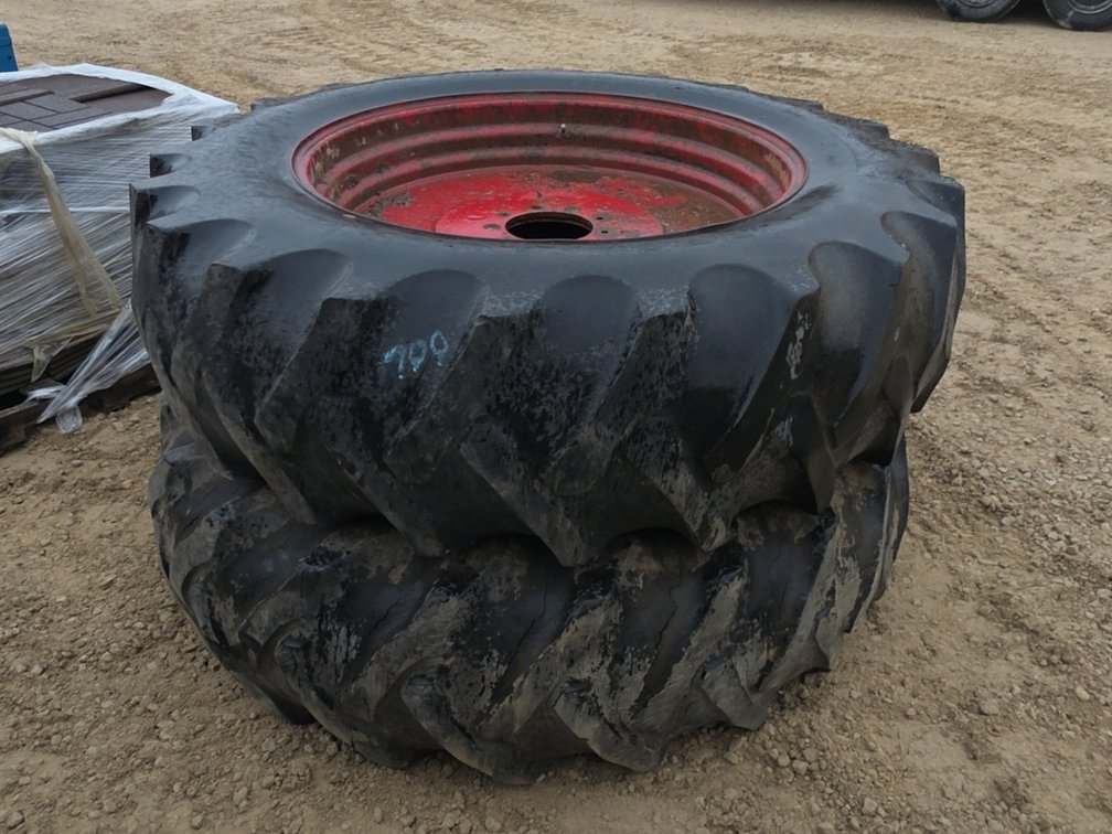 PAIR 18.4-38 TIRES ON 9 BOLT RIMS