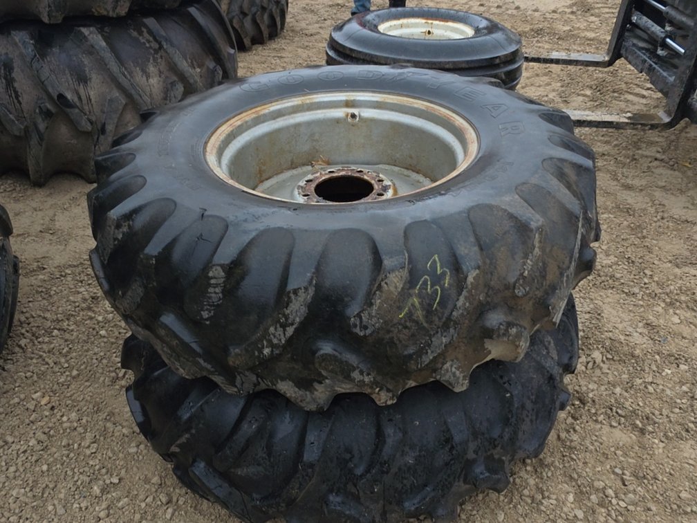 PAIR 14.9-24 TIRES ON 8 BOLT RIMS