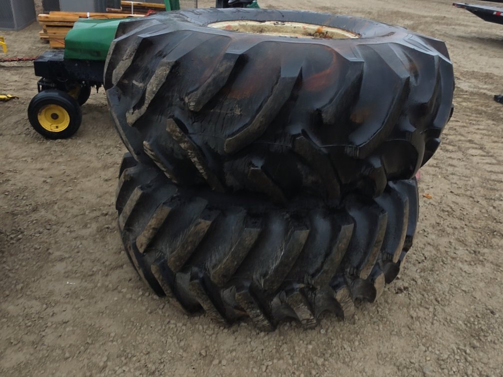 PAIR 23.1-26 TIRES ON 8 BOLT RIMS