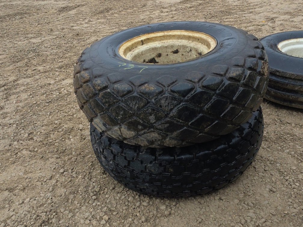 PAIR 12.4-16 TIRES ON 8 BOLT RIMS