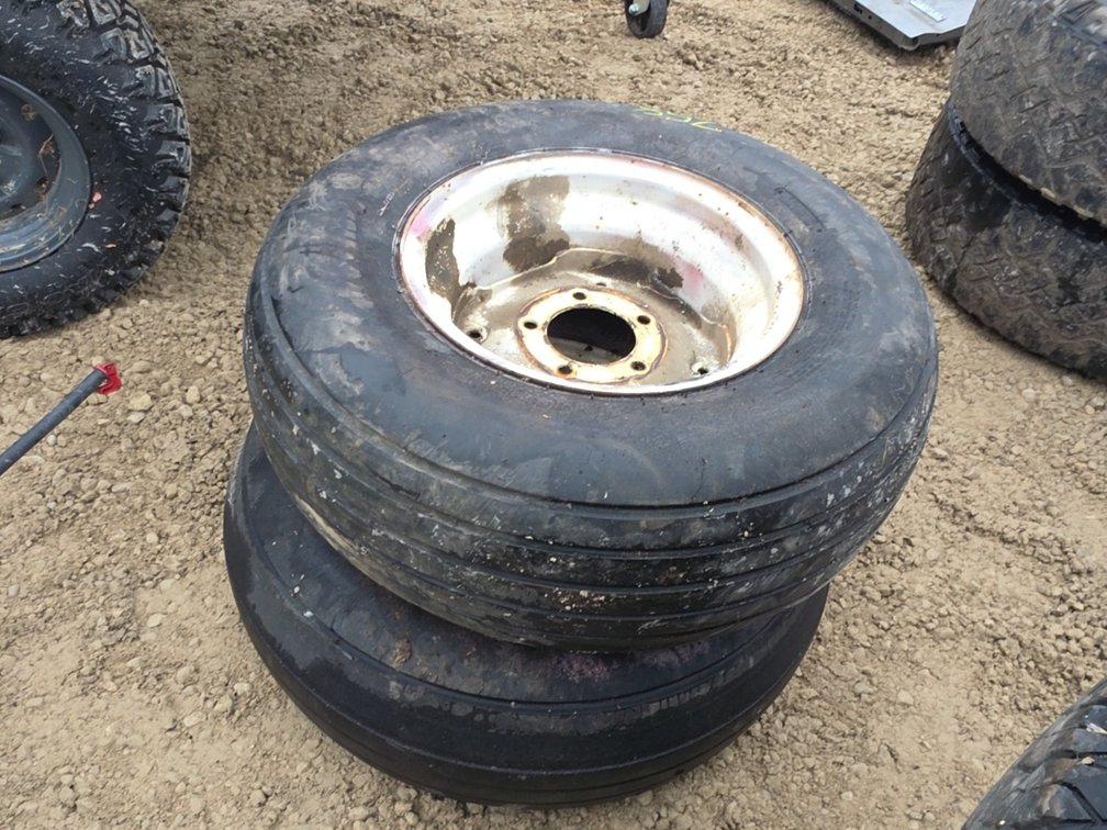 (2) 11L - 15 TIRES ON 5 BOLT IMPLEMENT RIMS