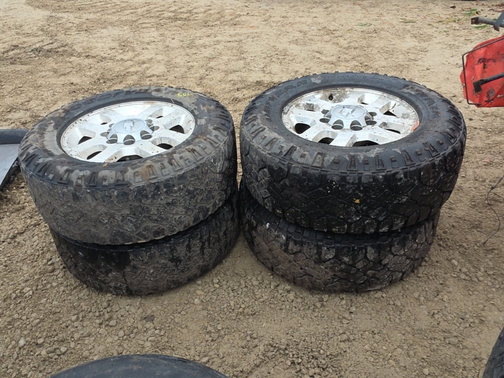 (4) 275/70 R18 TIRES ON 2011 & UP 8 BOLT RIMS