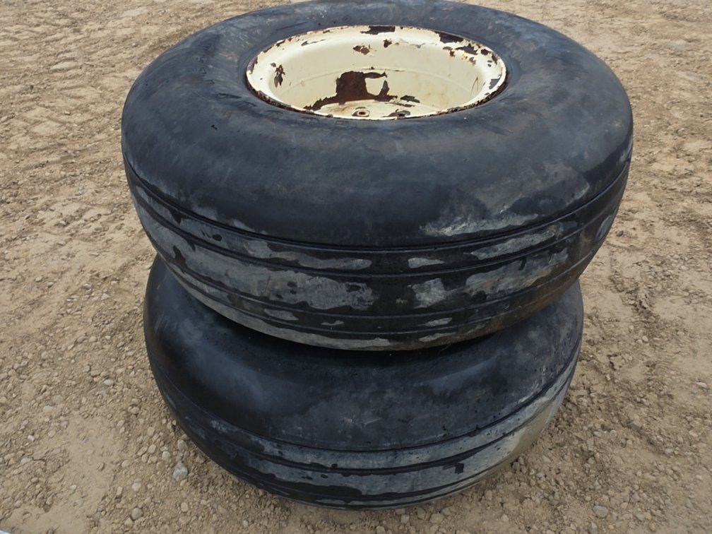 (2) 49X19.00-20 TIRES ON 10 BOLT RIMS