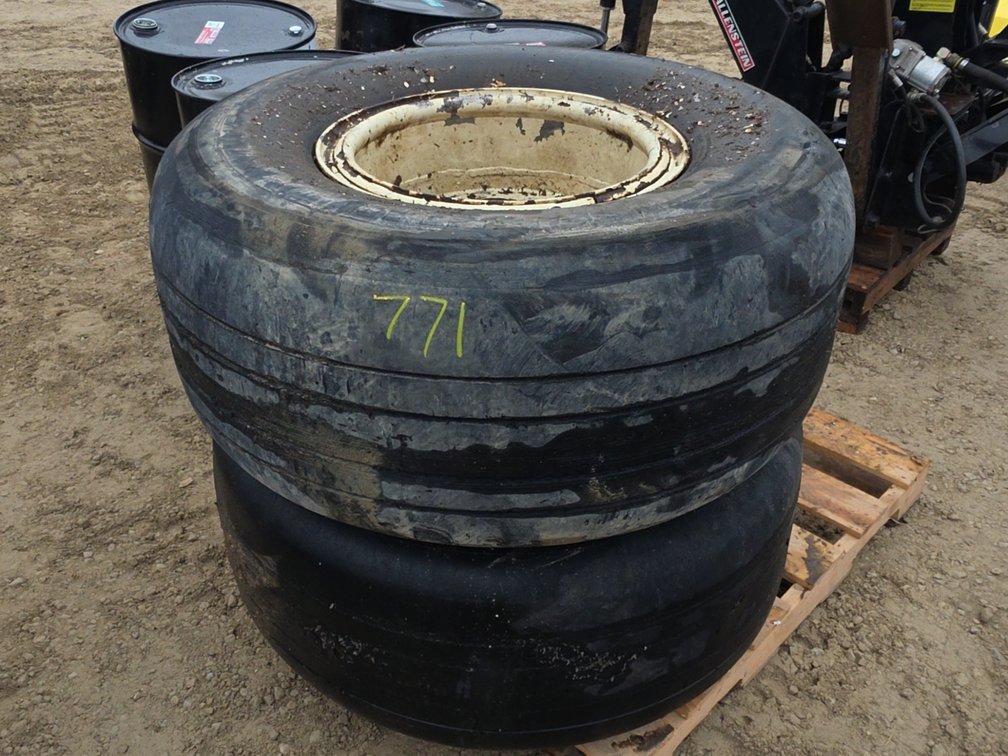 (2) 49X19.0-20 TIRES ON 10 BOLT SPLIT RIMS