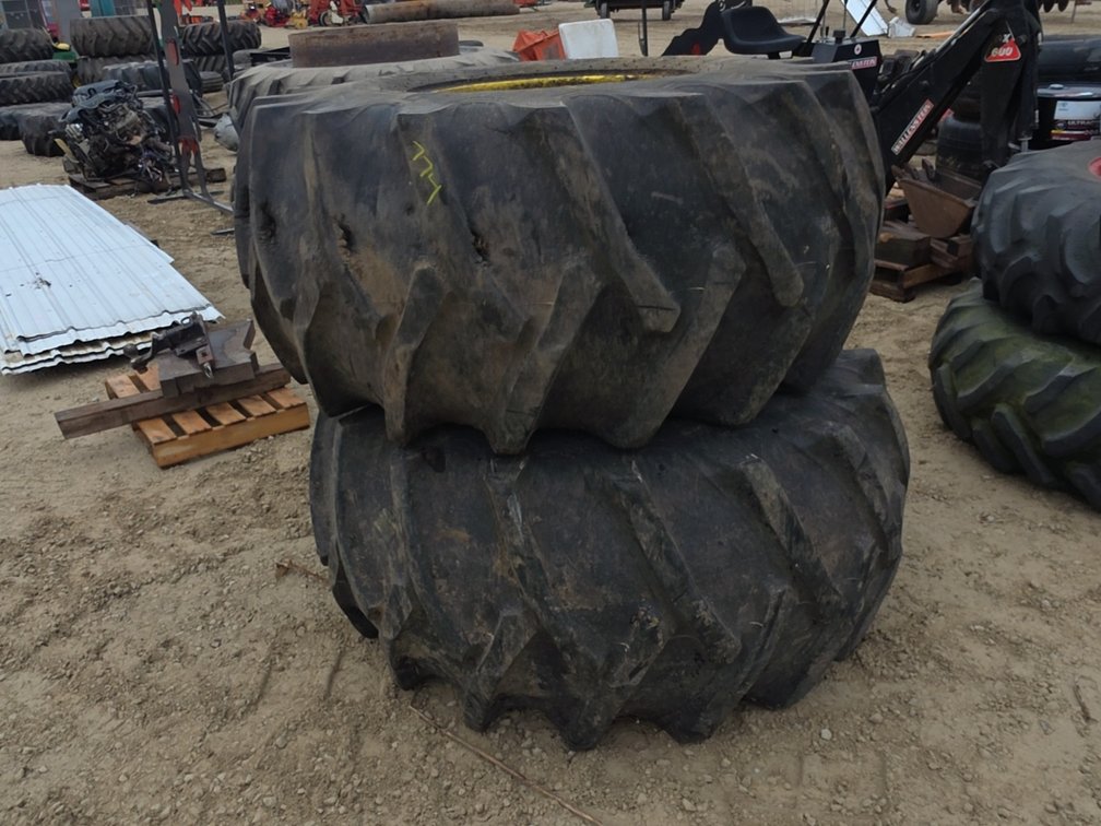 PAIR 28L-26 TIRES ON 8 BOLT RIMS