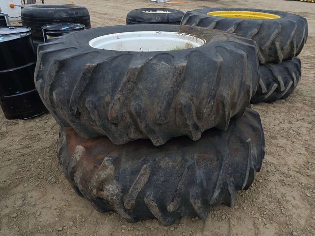 PAIR 20.8-34 TIRES ON 10 BOLT RIMS