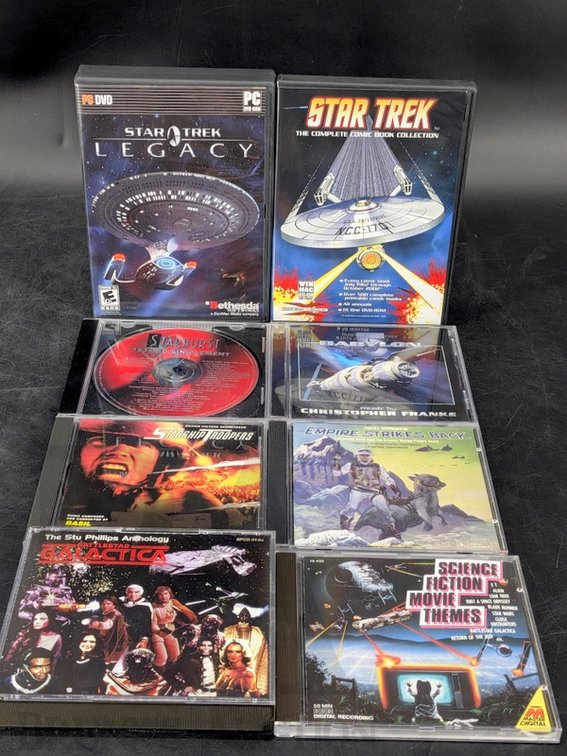 Science Fiction Soundtrack CDs, Star Trek Legacy PC Game, Comic Book DVD Collection (9 Items)