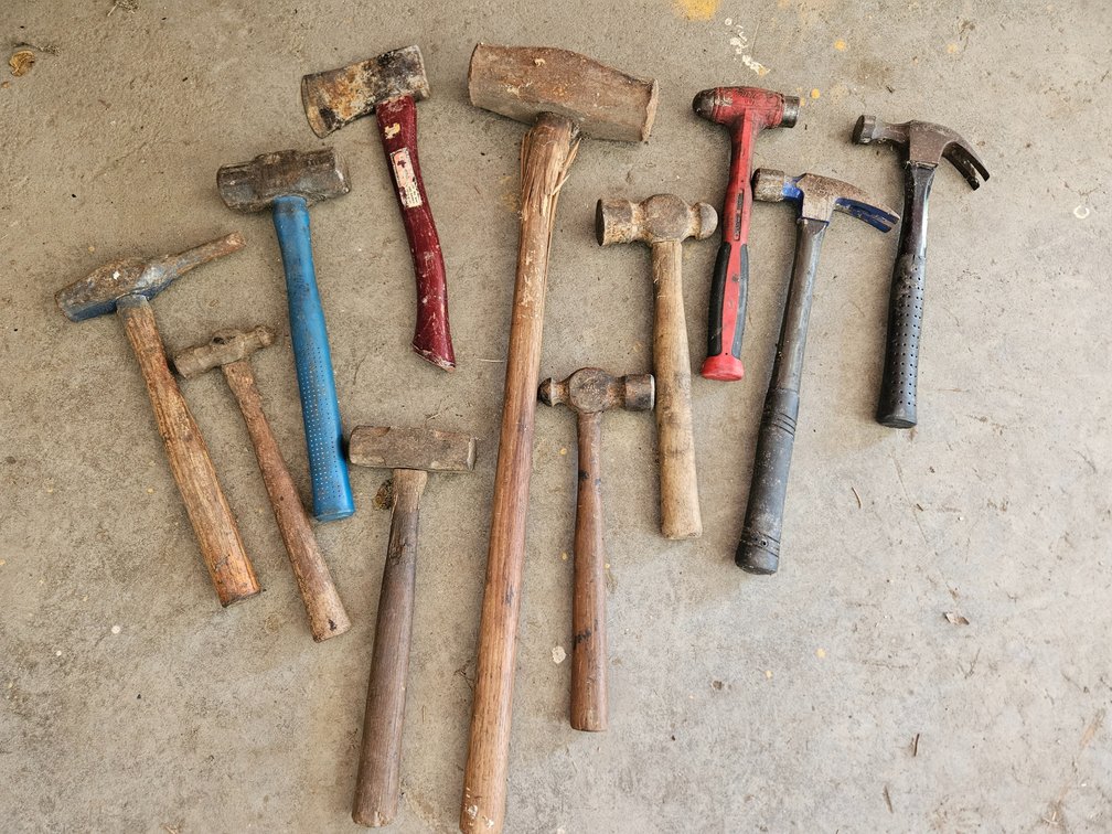 Assorted Striking Hand Tools Including Hammers and Hatchet