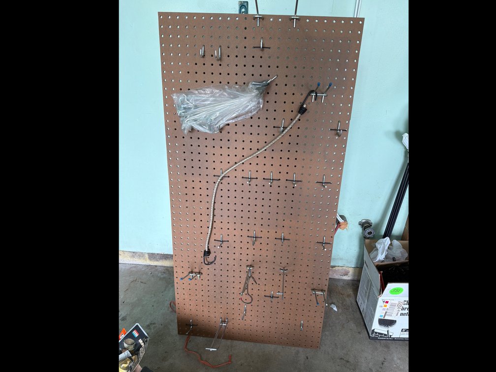 Hardboard Pegboard Panel with Metal Hooks and Accessories