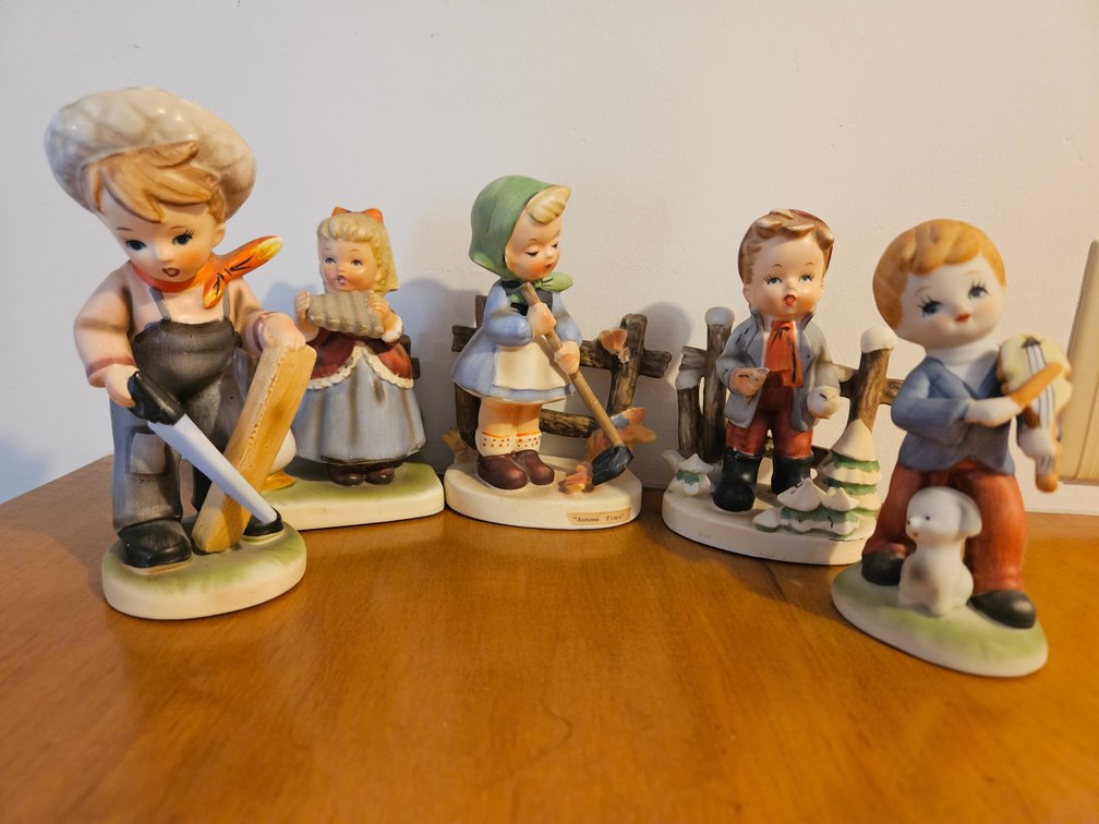 Five Painted Ceramic Children Figurines