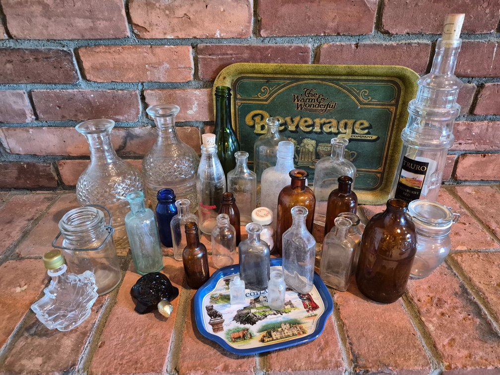 Glass Bottles, Decanters, Jars, and Metal Trays