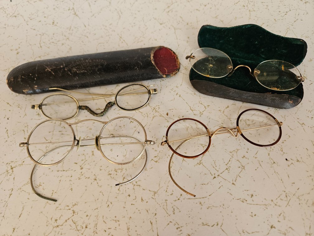 Four Antique Pairs of Spectacles and Two Eyeglass Cases