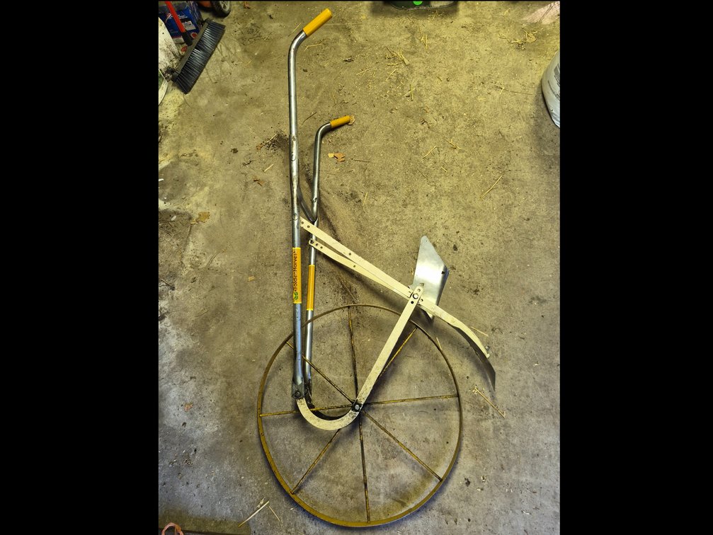 Manual Wheel Cultivator and Owner's Guide