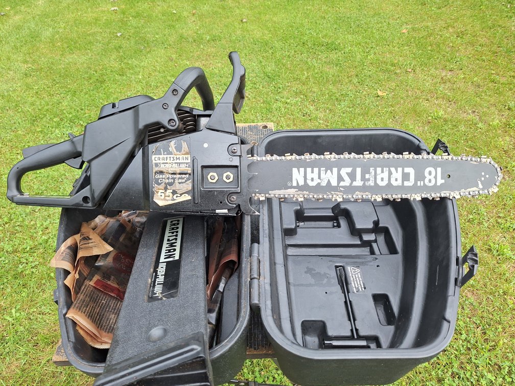 CraftsmanGas Chainsaw with Case, Fuel Can, Chains, and Tools