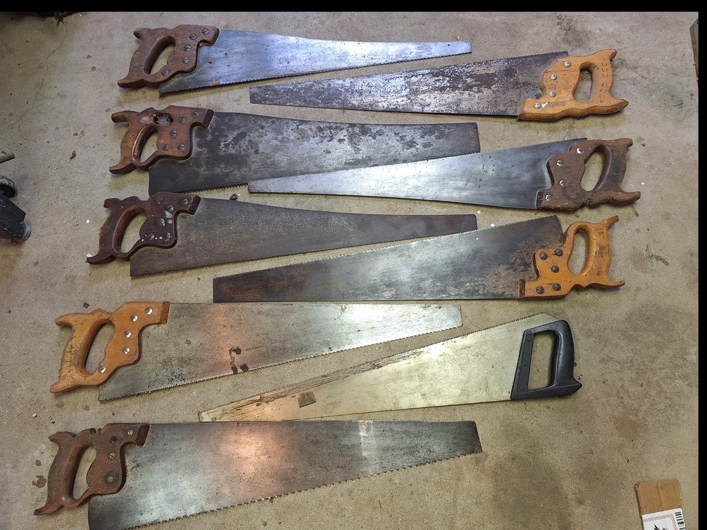 Steel Handsaws with Carved Wood and Molded Handles