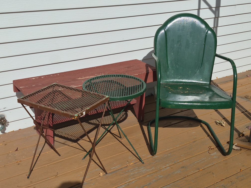 Metal Patio Armchair, Wooden Bench, and Mesh Side Tables