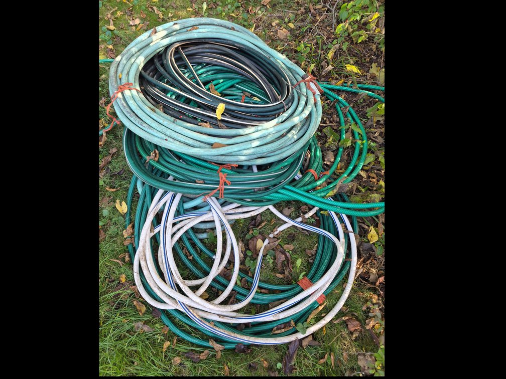 Coiled Garden Hoses in Multiple Colors