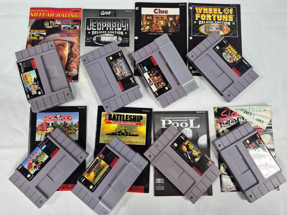 Super Nintendo Game Cartridges with Instruction Manuals