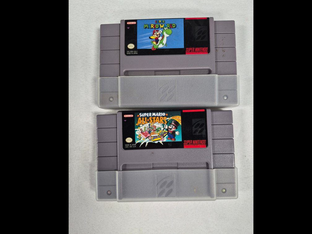 Nintendo SNES Super Mario World and Super Mario All-Stars Cartridges