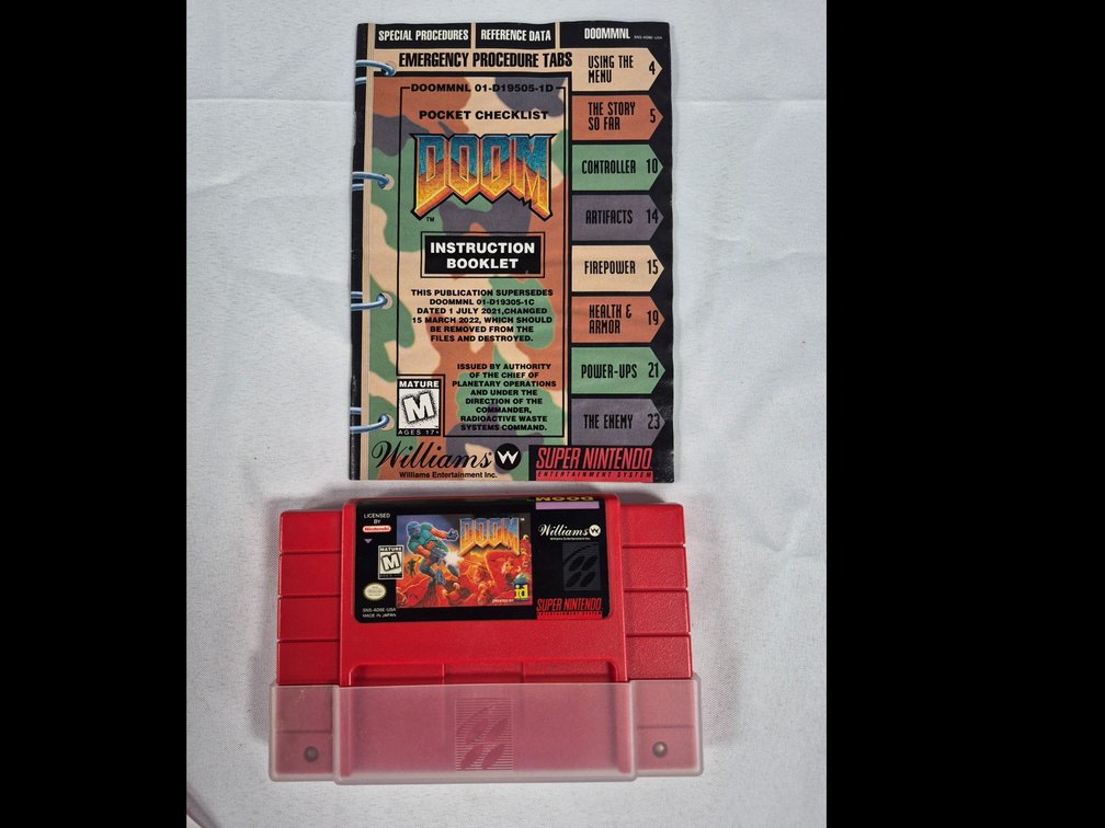 Super Nintendo Doom Cartridge and Instruction Booklet