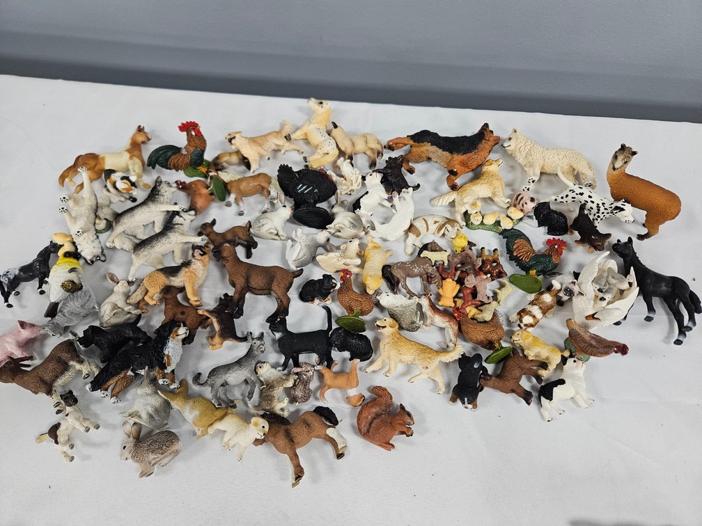 Plastic Animal Figurines of Dogs, Farm Animals, and More