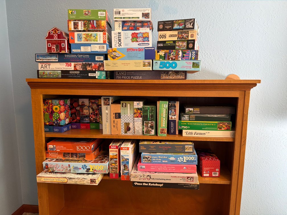 Boxed Jigsaw Puzzles, Puzzle Sorter, and Roll-Up Mat