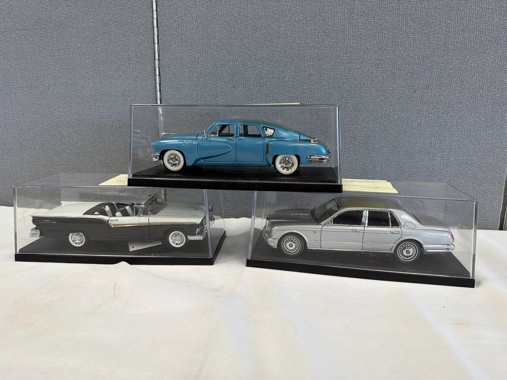 Diecast Scale Model Cars in Display Cases