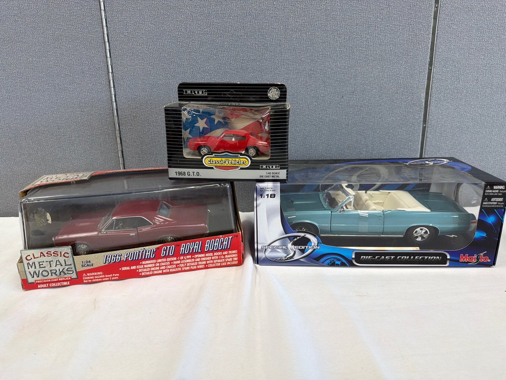Three Pontiac GTO Die-Cast Model Cars