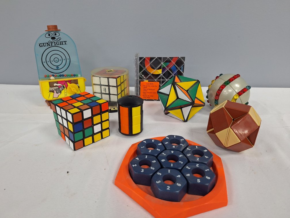 Rubik's Cubes, Mechanical Puzzles, and Target Game