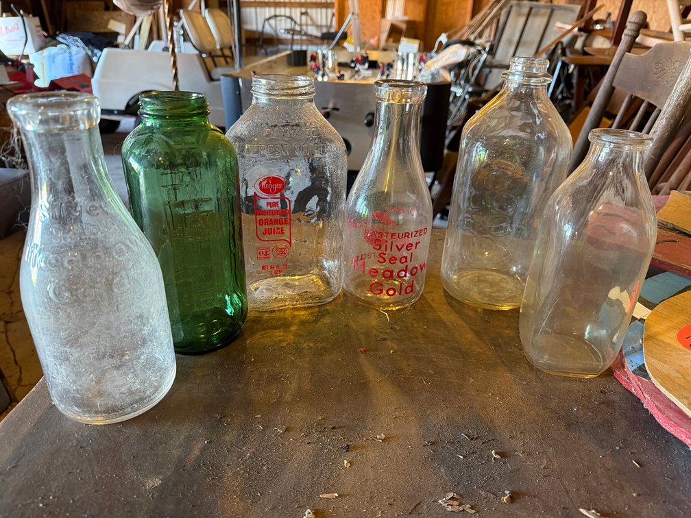 Clear and Green Glass Milk and Beverage Bottles