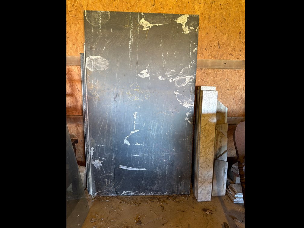 Slate Slabs, Marble Panels, and Glass Pane