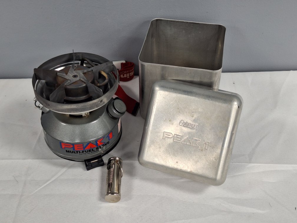 Coleman Peak 1 Model 550B Multi-Fuel Stove with Aluminum Case
