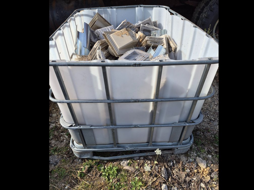 IBC Tote with Siding Mounting Blocks, Post Caps, and Sheet Metal