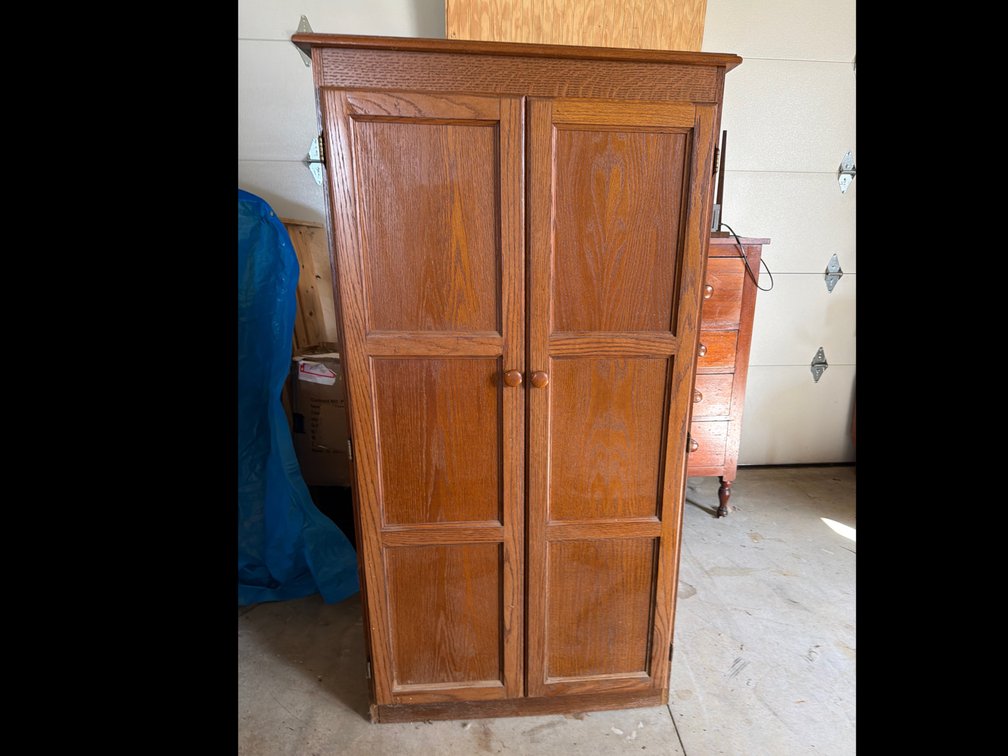 Oak Two-Door Storage Cabinet with Interior Shelf