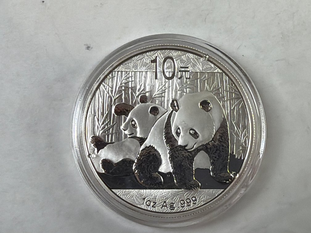 PANDA ONE OUNCE SILVER ROUND