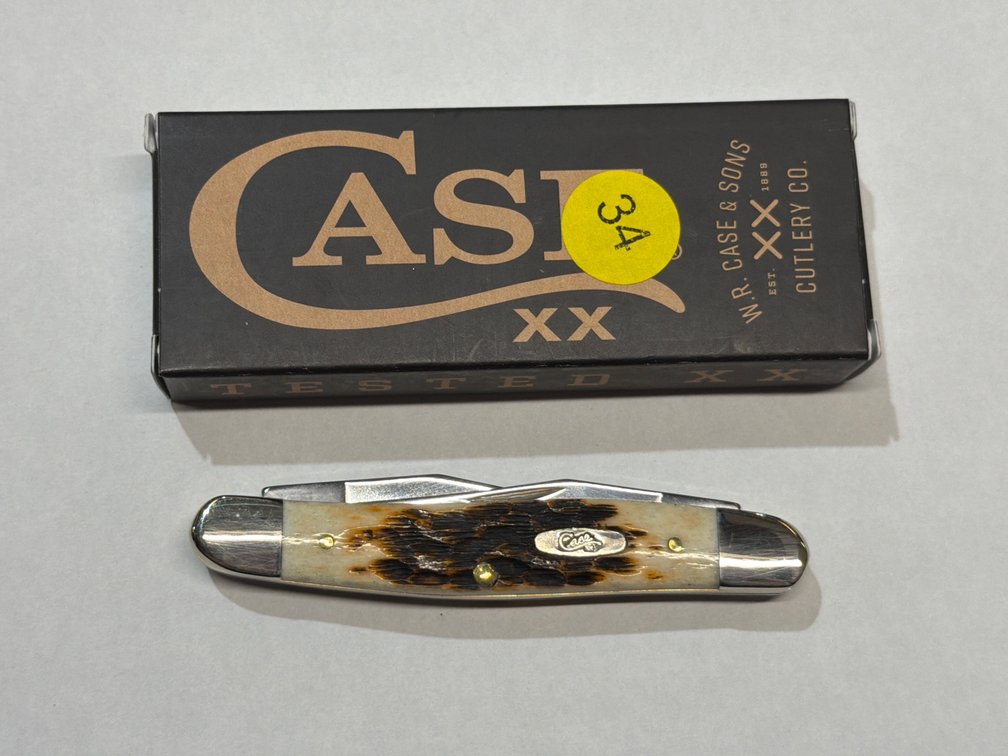 CASE XX AMBER BONE PEACH SEED JIG MUSKRAT KNIFE