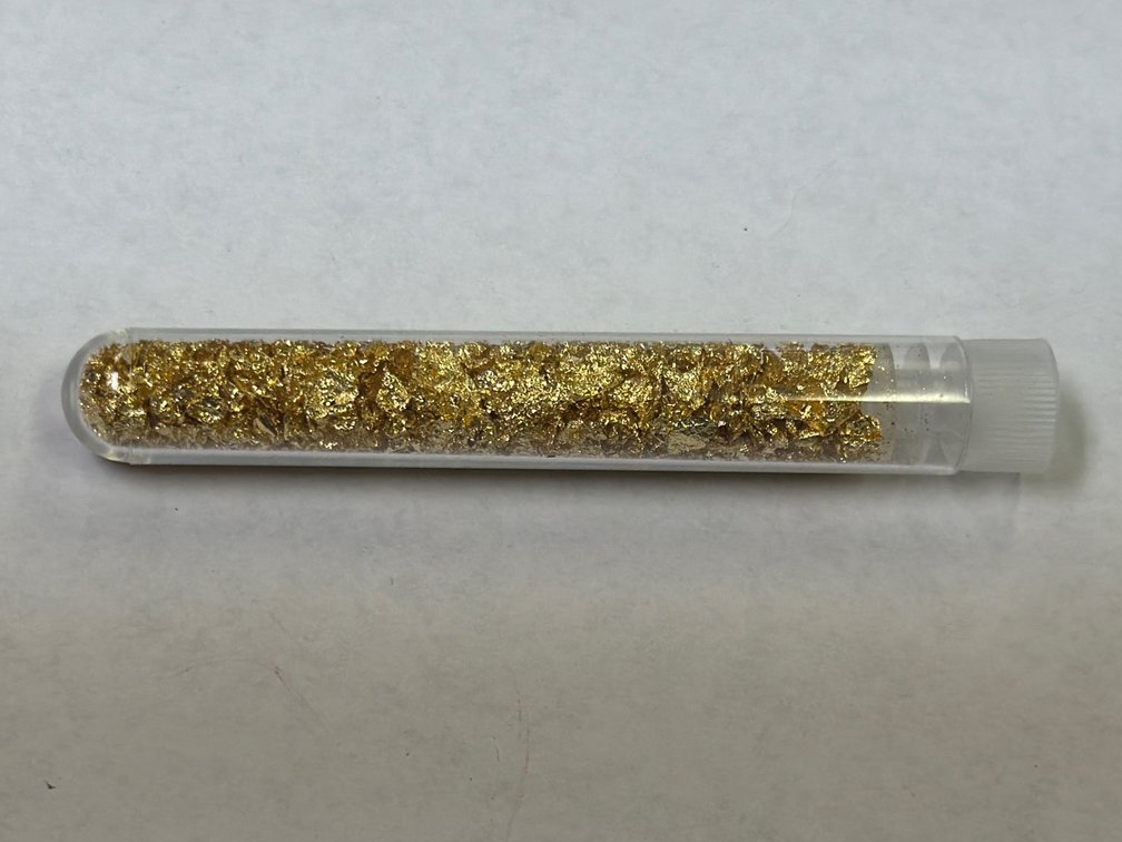 SMALL TUBE OF GOLD FLAKES