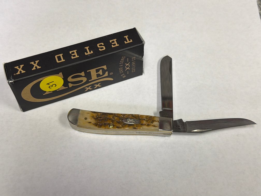 CASE XX AMBER BONE PEACH SEED JIG MINI TRAPPER KNIFE