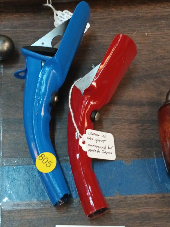 (2) OIL SPOUTS
